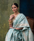 Light_Blue_Handloom_Pure_Katan_Silk_Banarasi_Saree_With_Gold_Zari_Jaal_And_Yellow_Blouse_WeaverStory_01