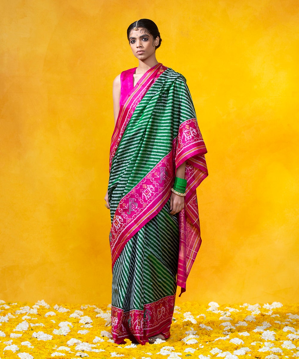 Green_Handloom_Mulberry_Silk_Diagonal_Weave_Ikat_Patola_Saree_With_Pink_Border_WeaverStory_02