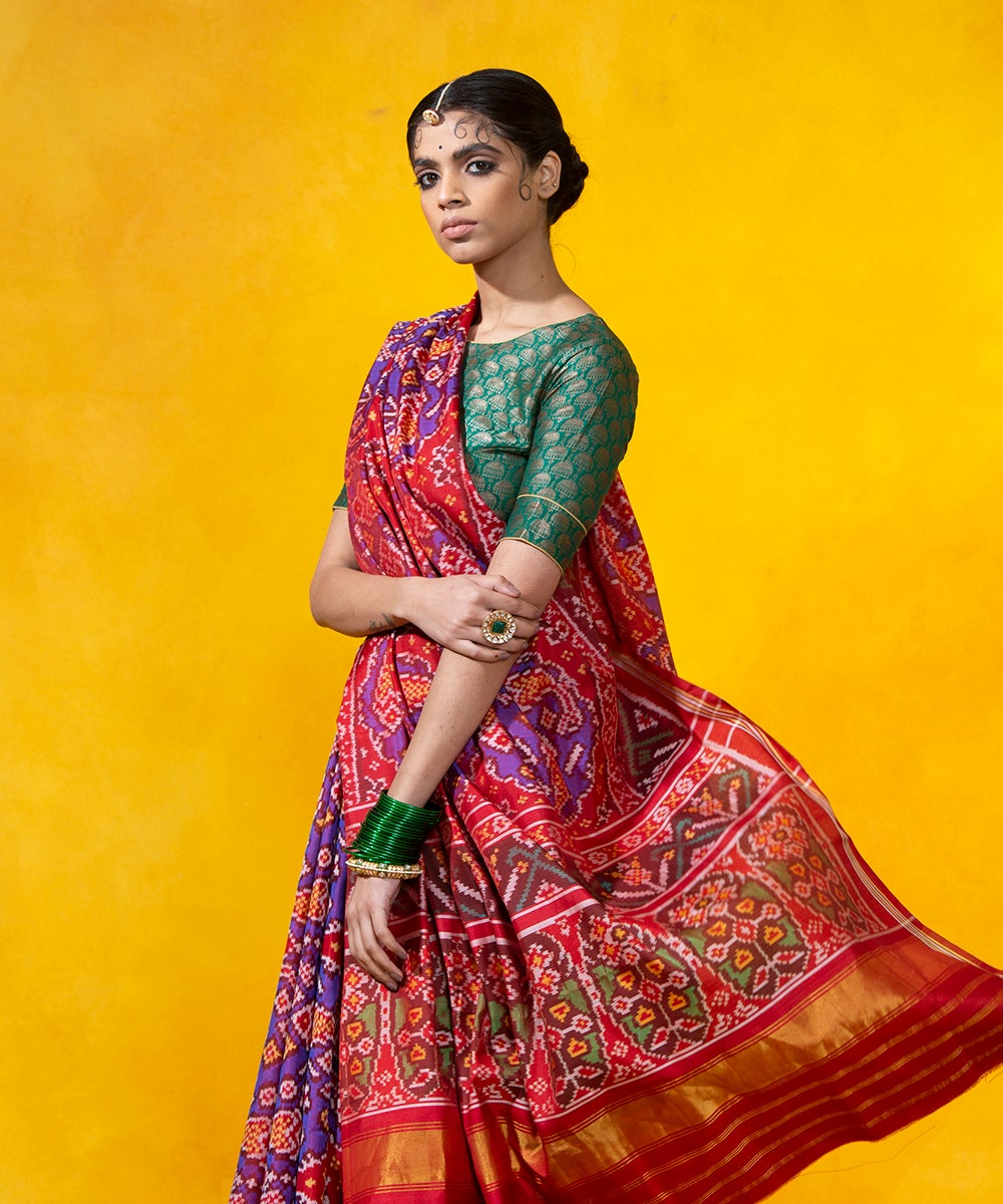 Purple_And_Red_Handloom_Mulberry_Fish_Motif_Ikat_Patola_Saree_With_Red_Border_WeaverStory_01