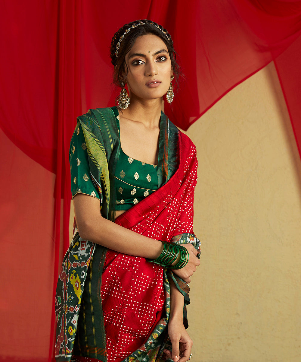 Handloom_Red_Ikat_Patola_Saree_With_Green_Elephant_Border_And_Bandhani_Work_WeaverStory_01