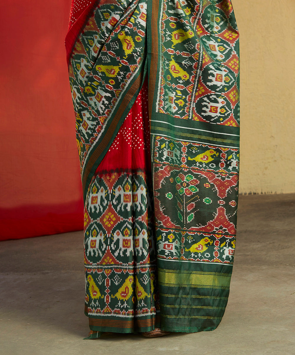 Handloom_Red_Ikat_Patola_Saree_With_Green_Elephant_Border_And_Bandhani_Work_WeaverStory_04