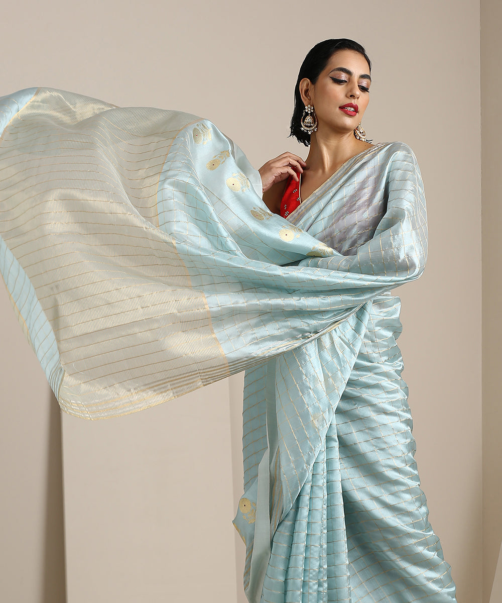 Powder_Blue_Handloom_Chanderi_Silk_Saree_With_Zari_Checks_And_Floral_Motifs_WeaverStory_01