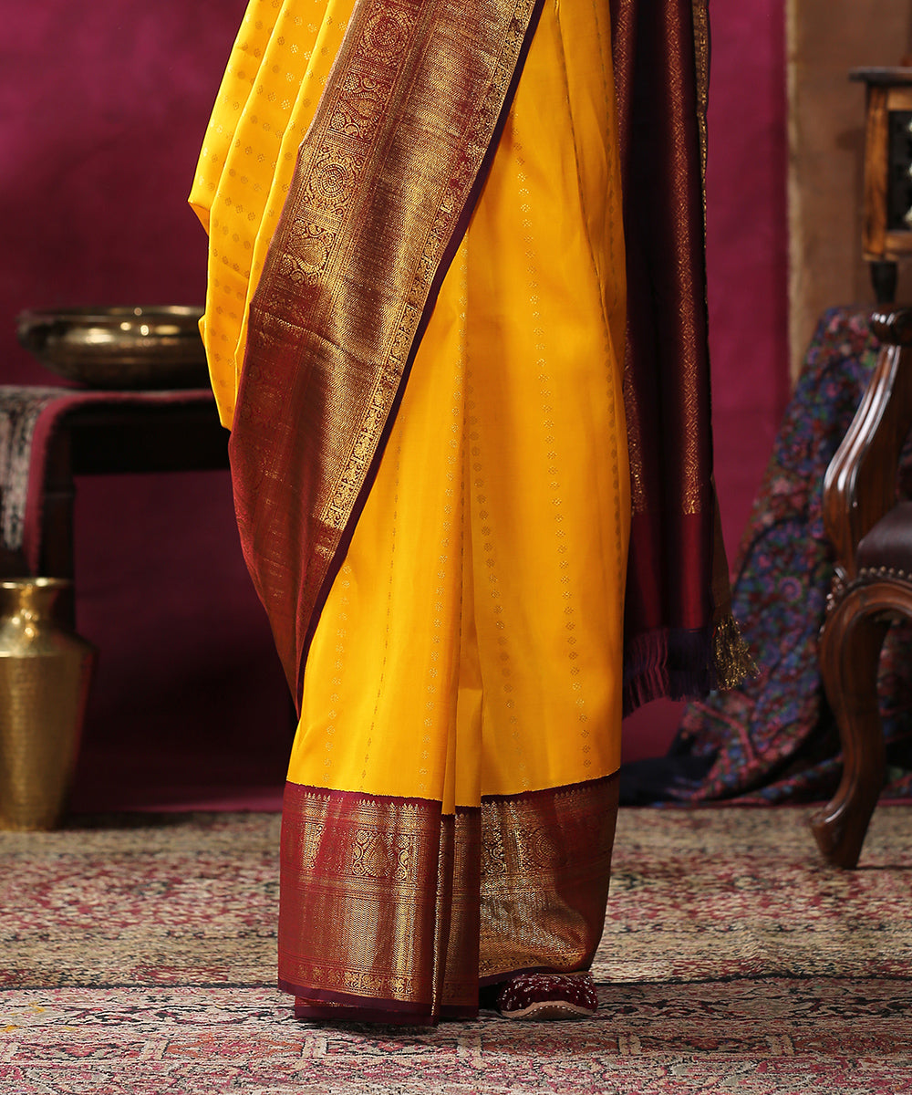 Yellow_Handloom_Pure_Silk_Kanjivaram_Saree_With_Wine_And_Gold_Border_WeaverStory_04