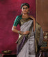 Handloom_Grey_Pure_Silk_Kanjivaram_Saree_With_Embossed_Weave_And_Purple_And_Gold_Border_WeaverStory_01