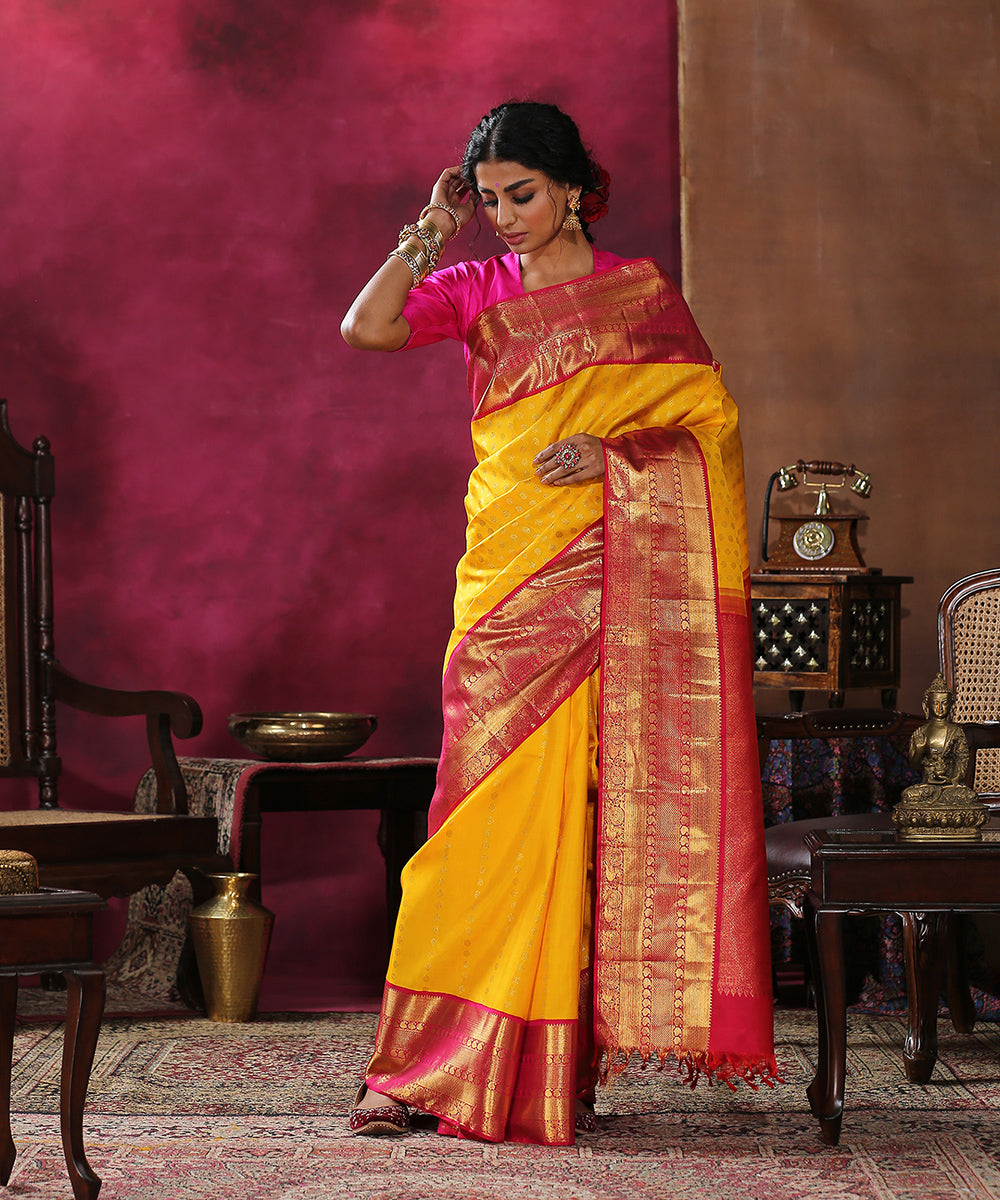 Handloom_Yellow_Pure_Silk_Kanjivaram_Saree_With_Pink_And_Gold_Broad_Borders_WeaverStory_02