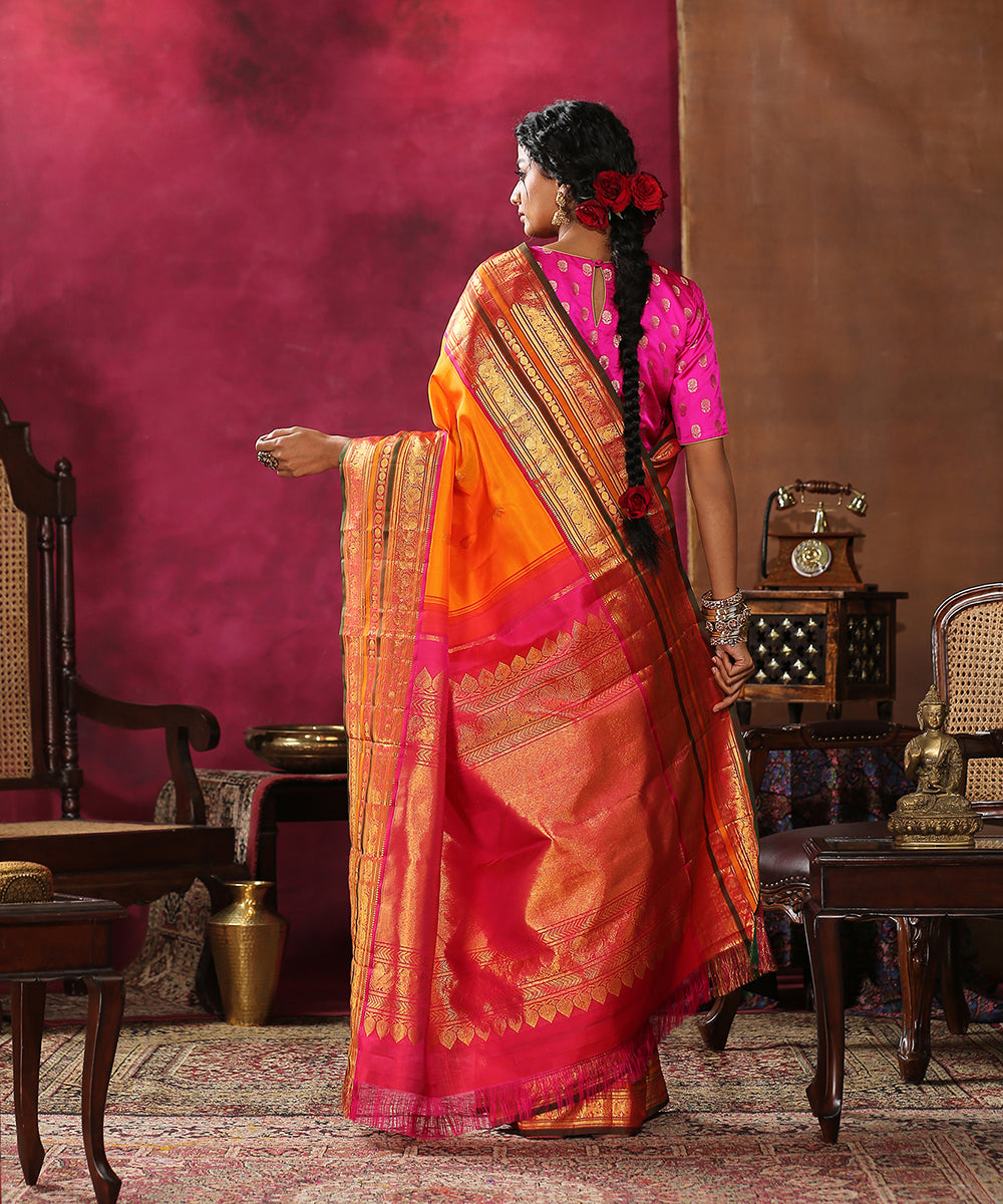 Handloom_Orange_Pure_Silk_Kanjivaram_Saree_With_Pink_And_Green_Border_WeaverStory_03