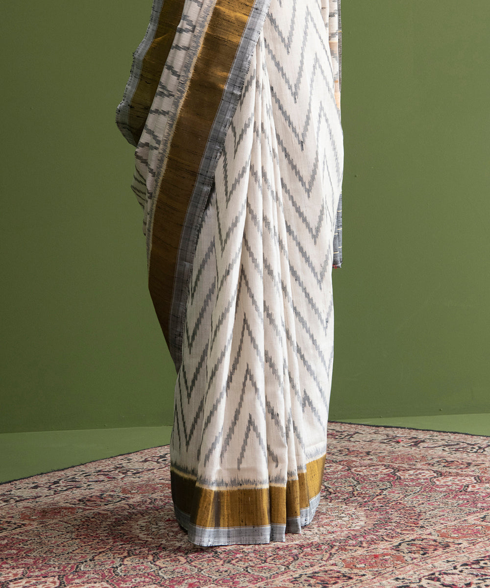 White_And_Grey_Handloom_Raw_Silk_Weft_Dyed_Rajkot_Patola_Saree_WeaverStory_04