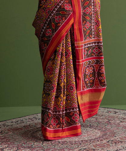 Handloom_Mustard_And_Red_Single_Ikat_Weft_Dyed_8_Ply_Mulberry_Silk_Patola_Saree_WeaverStory_04