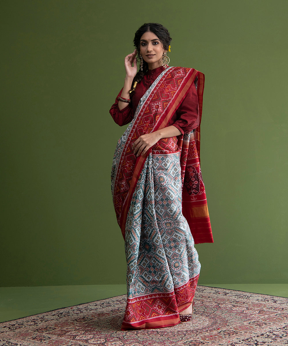 White_And_Red_Handloom_Single_Ikat_Weft_Dyed_8_Ply_Mulberry_Silk_Patola_Saree_WeaverStory_02