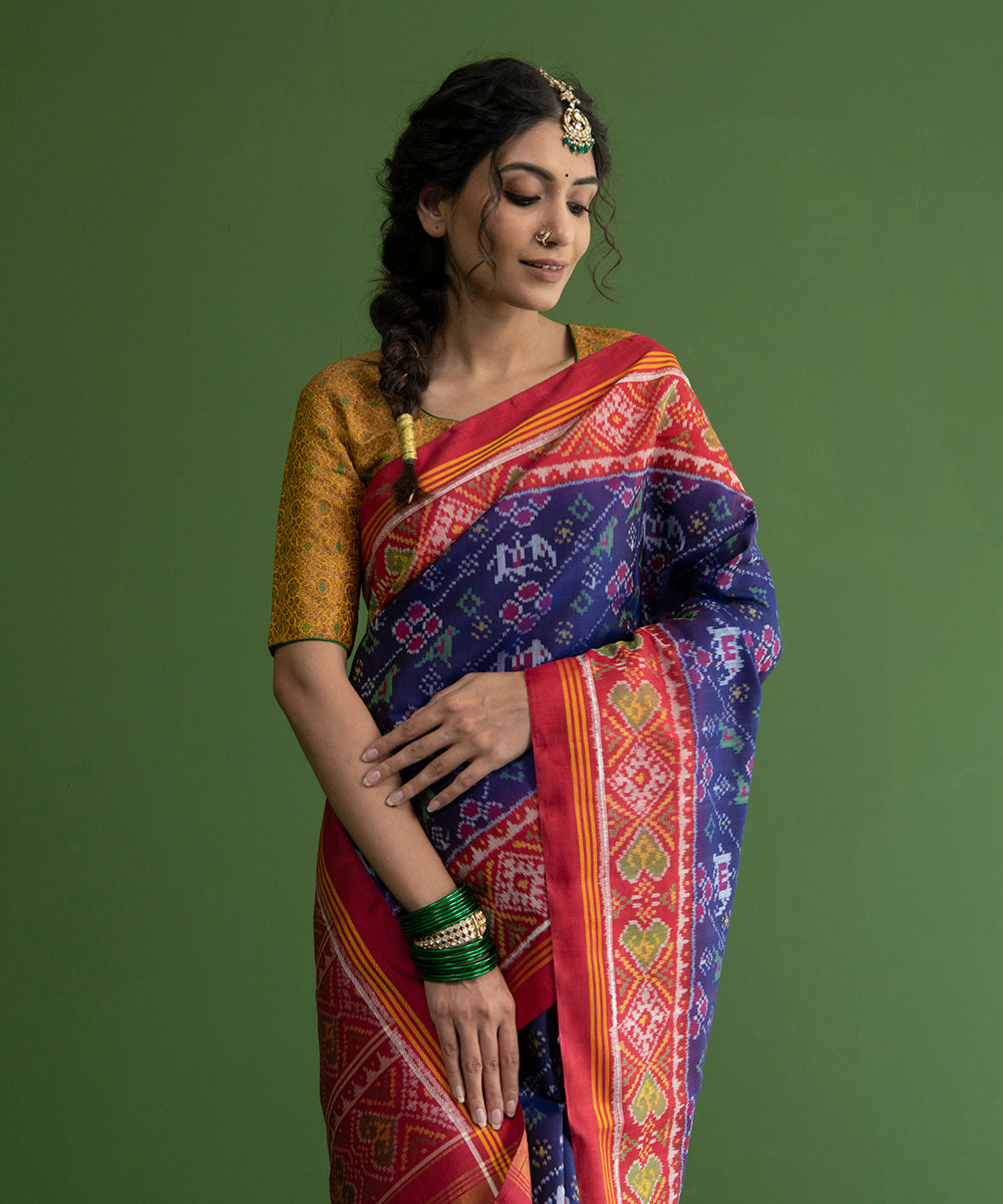 Handloom_Blue_And_Red_Ikat_Weft_Dye_8_Ply_Mulberry_Silk_Patola_Saree_WeaverStory_01