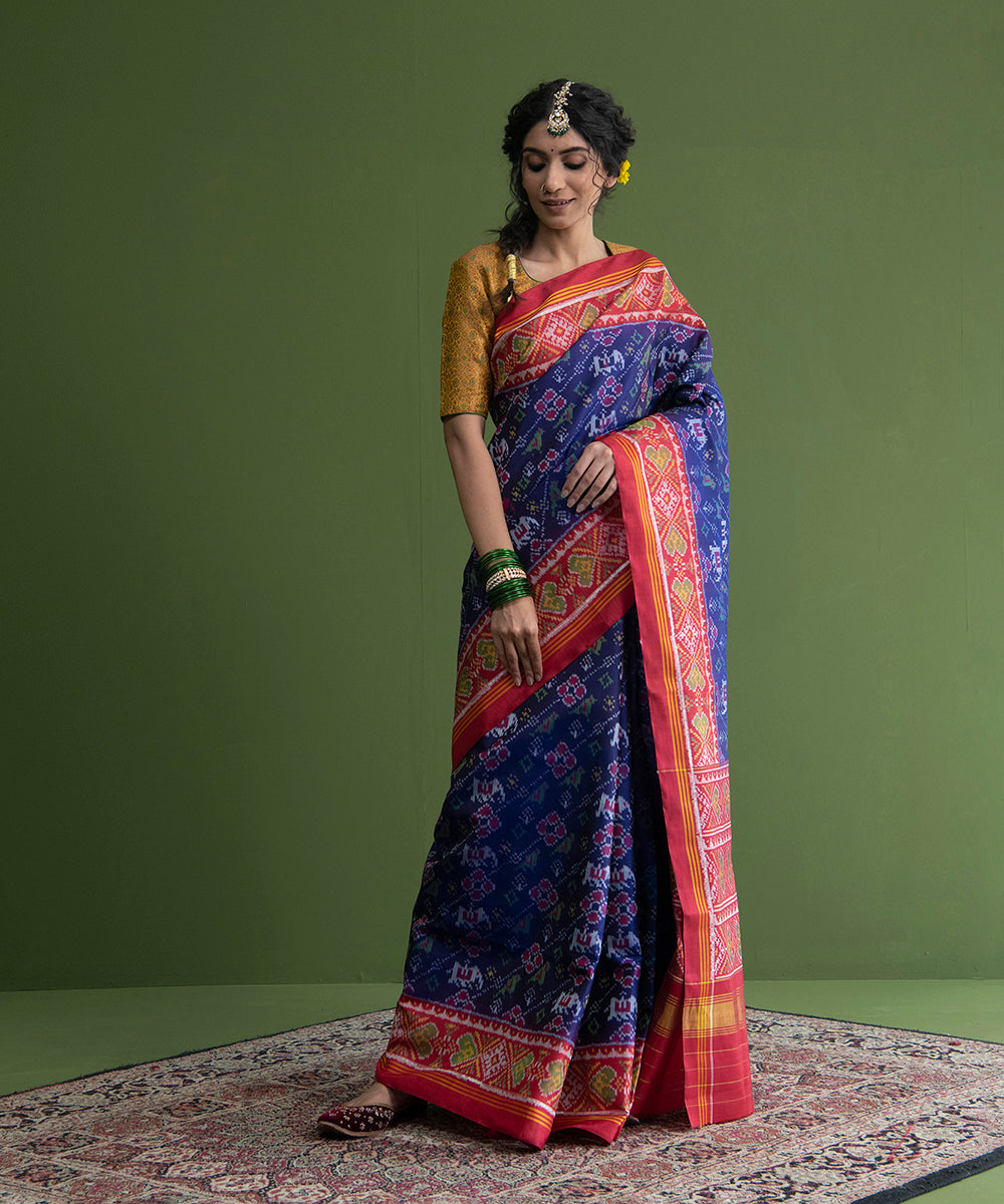 Handloom_Blue_And_Red_Ikat_Weft_Dye_8_Ply_Mulberry_Silk_Patola_Saree_WeaverStory_02