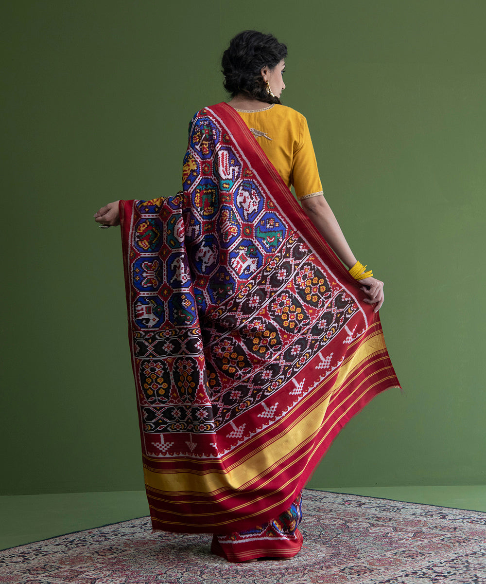 Blue_And_Red_Handloom_Weft_Dyed_Patola_Saree_With_8_Ply_Mulberry_Silk_And_Animal_Motifs_WeaverStory_02