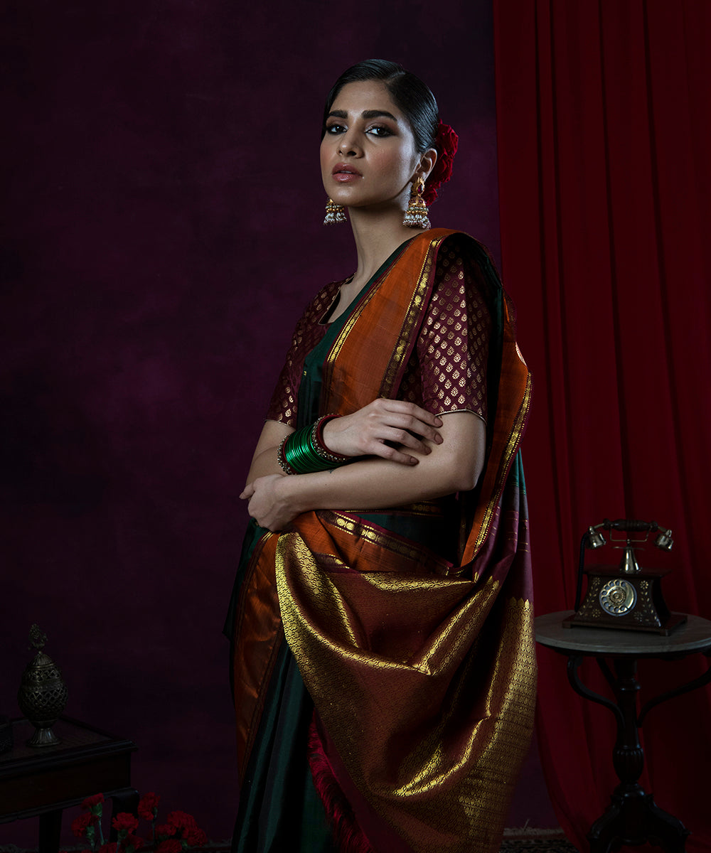 Handloom_Bottle_Green_Pure_Silk_Kanjivaram_Saree_With_Rust_And_Maroon_Border_WeaverStory_01