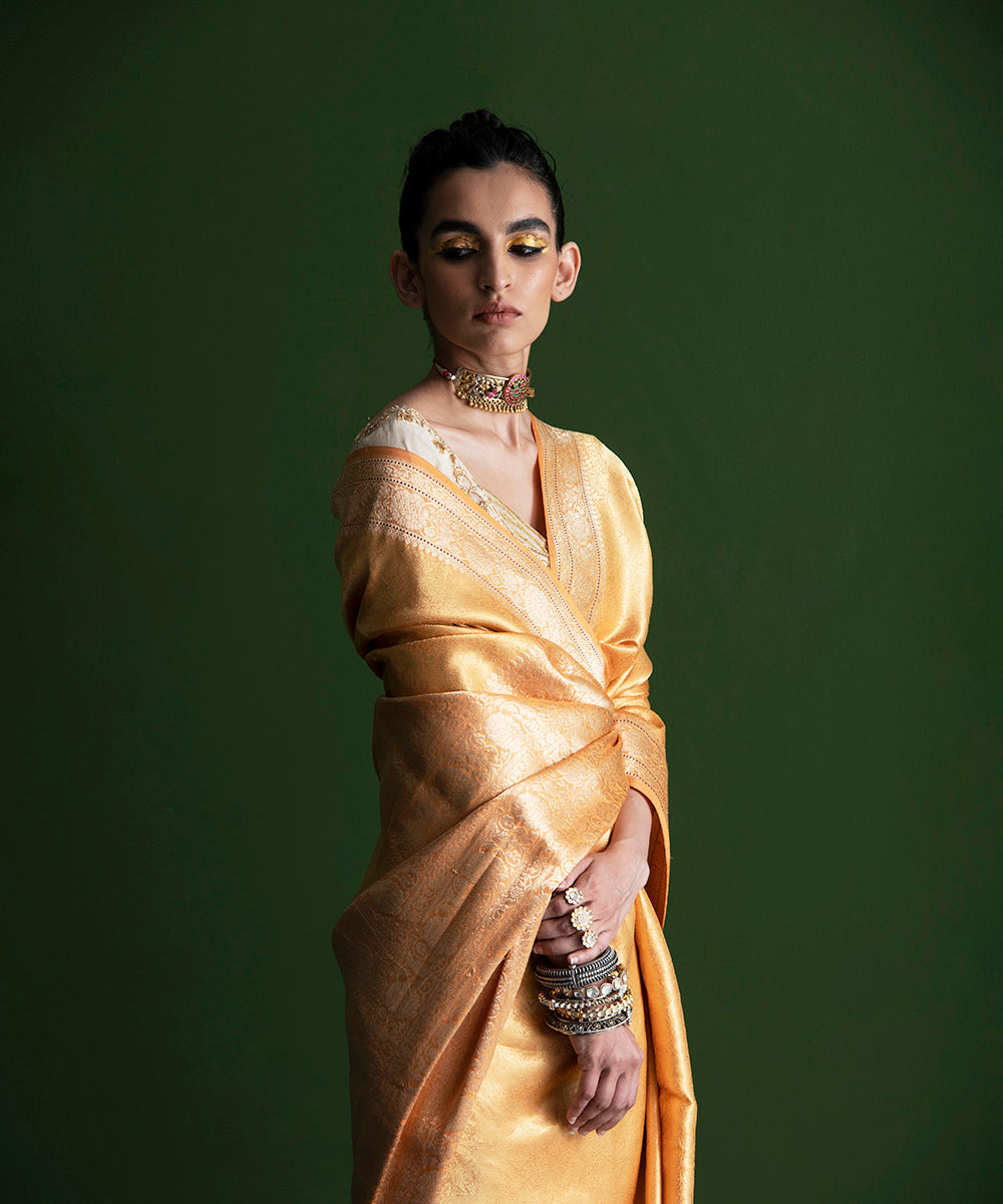 Handloom_Soft_Peachy_Orange_Pure_Katan_Silk_Tanchoi_Banarasi_Saree_with_Kadhwa_Border_WeaverStory_01