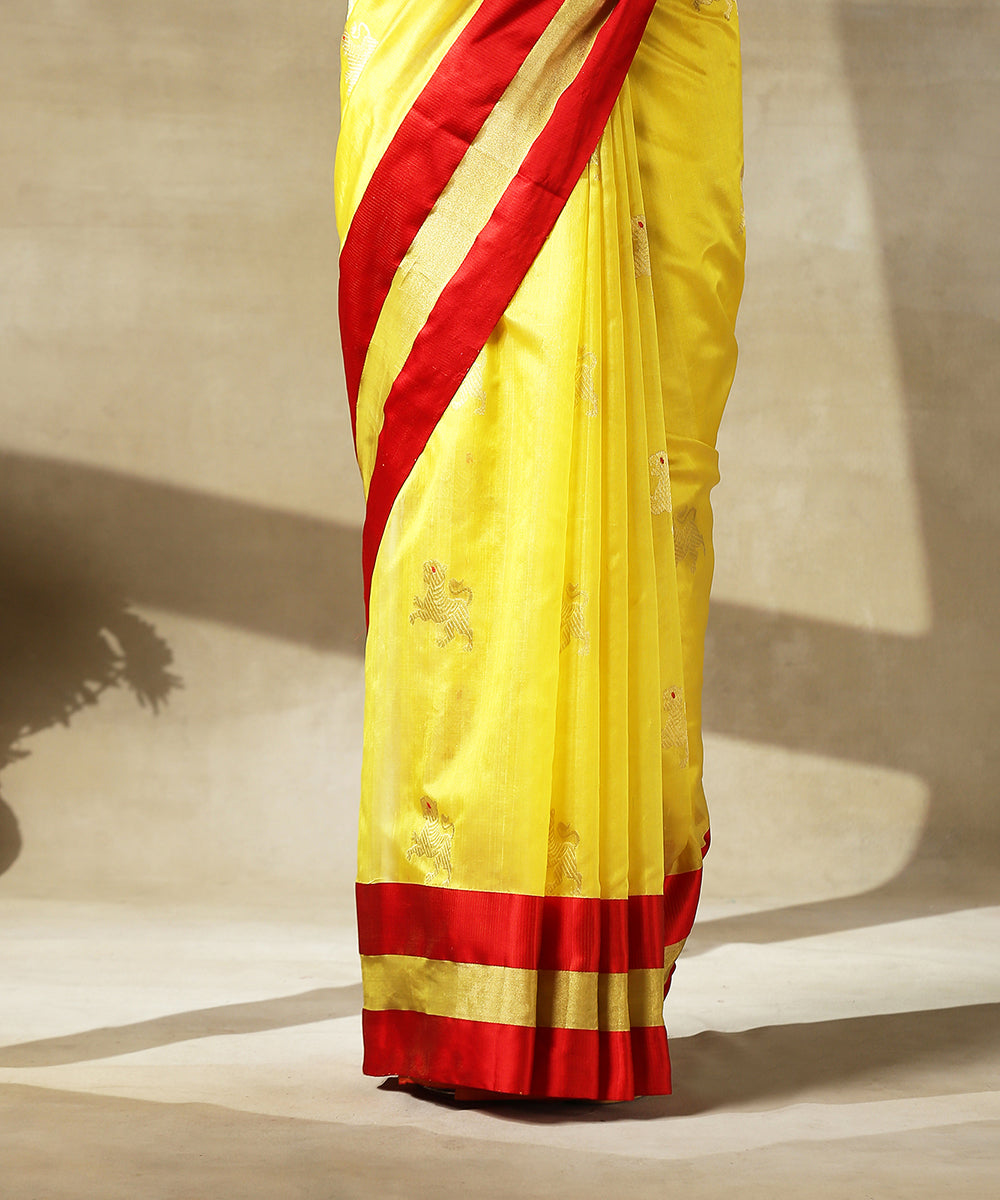 Yellow_Handloom_Chanderi_Silk_Saree_With_Eknaliya_Lion_Motifs_And_Red_Mashroo_Border_WeaverStory_04