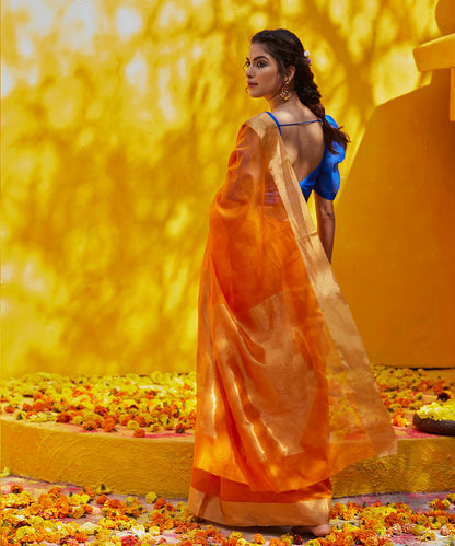 Orange_Handloom_Plain_Cotton_Silk_Chanderi_Saree_With_Zari_Border_WeaverStory_03