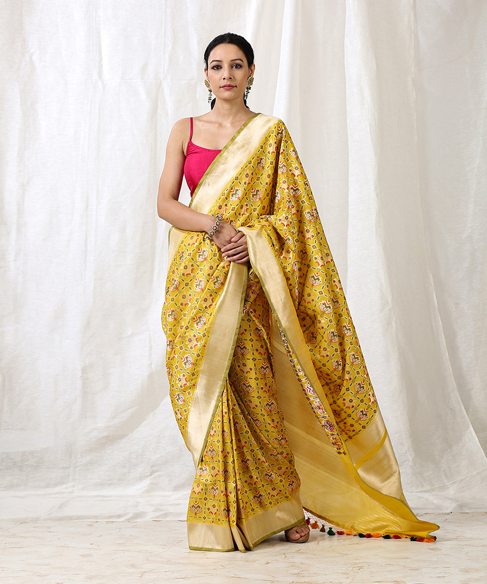 Yellow_Handloom_Pure_Katan_Silk_Patola_Saree_With_Zari_Border_WeaverStory_02