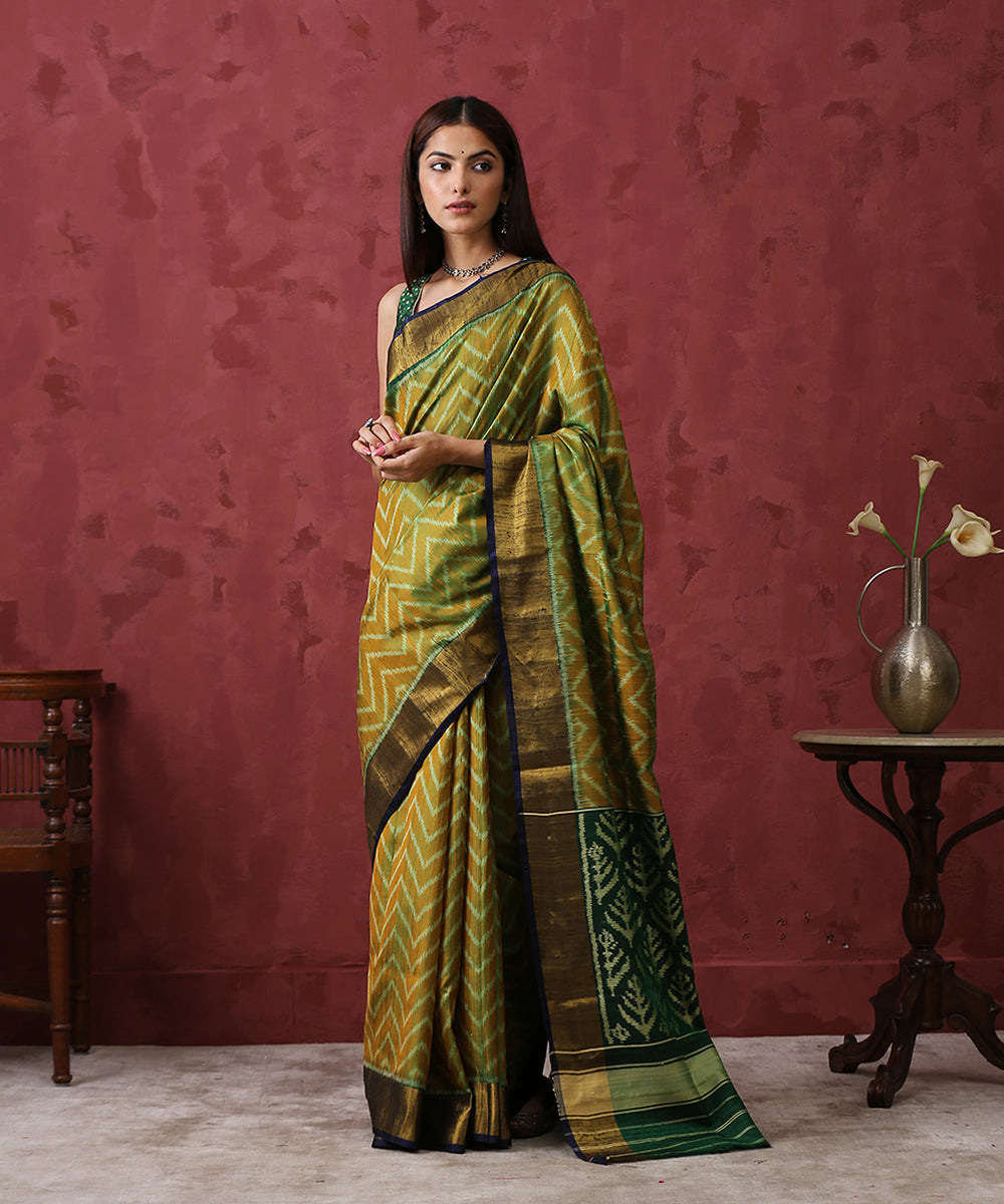 Handloom_Mustard_and_Green_Raw_Silk_Patola_Saree_With_Gold_Border_And_Green_Pallu_WeaverStory_02