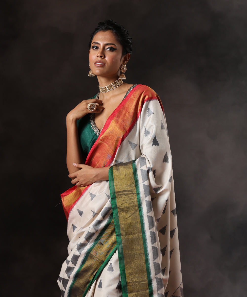 Handloom_Black_And_White_Pure_Mulberry_Silk_Patola_Saree_With_Red_And_Green_Border_WeaverStory_01
