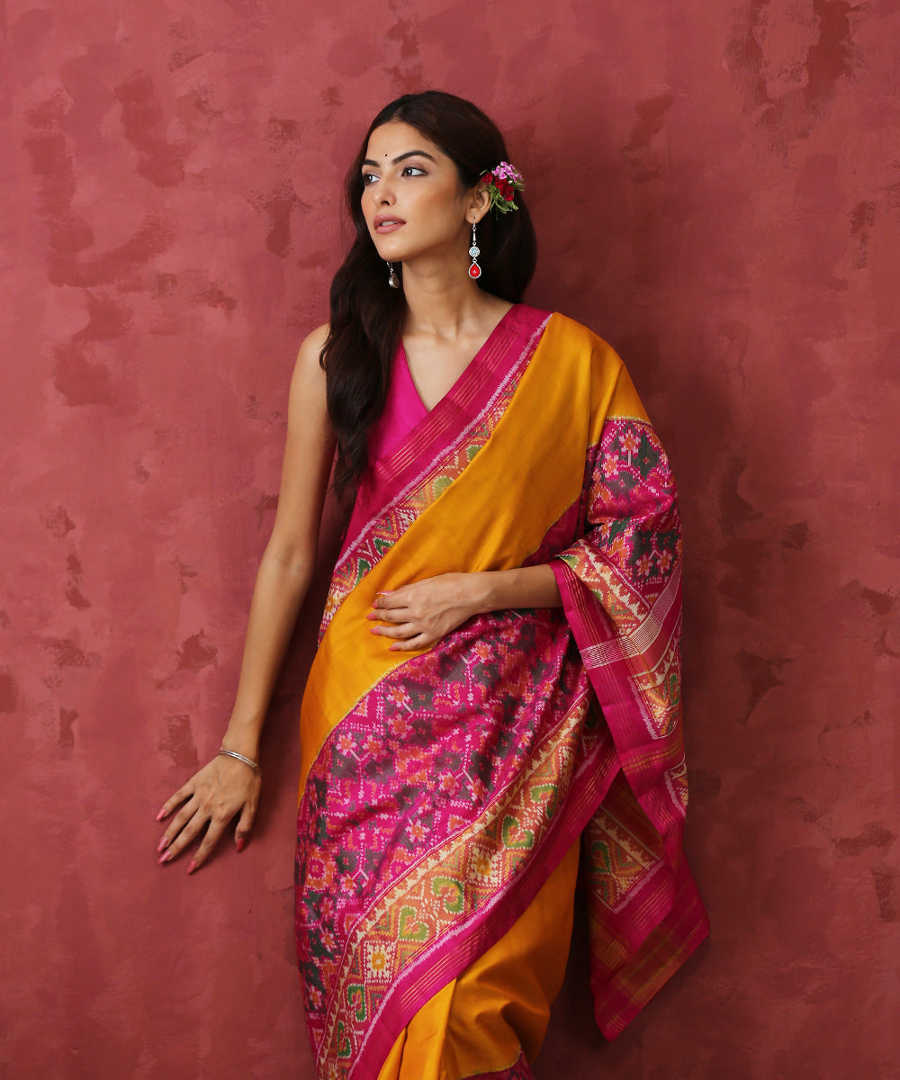 Mustard_Handloom_Mulberry_Silk_Patola_Saree_With_Pink_Border_WeaverStory_01