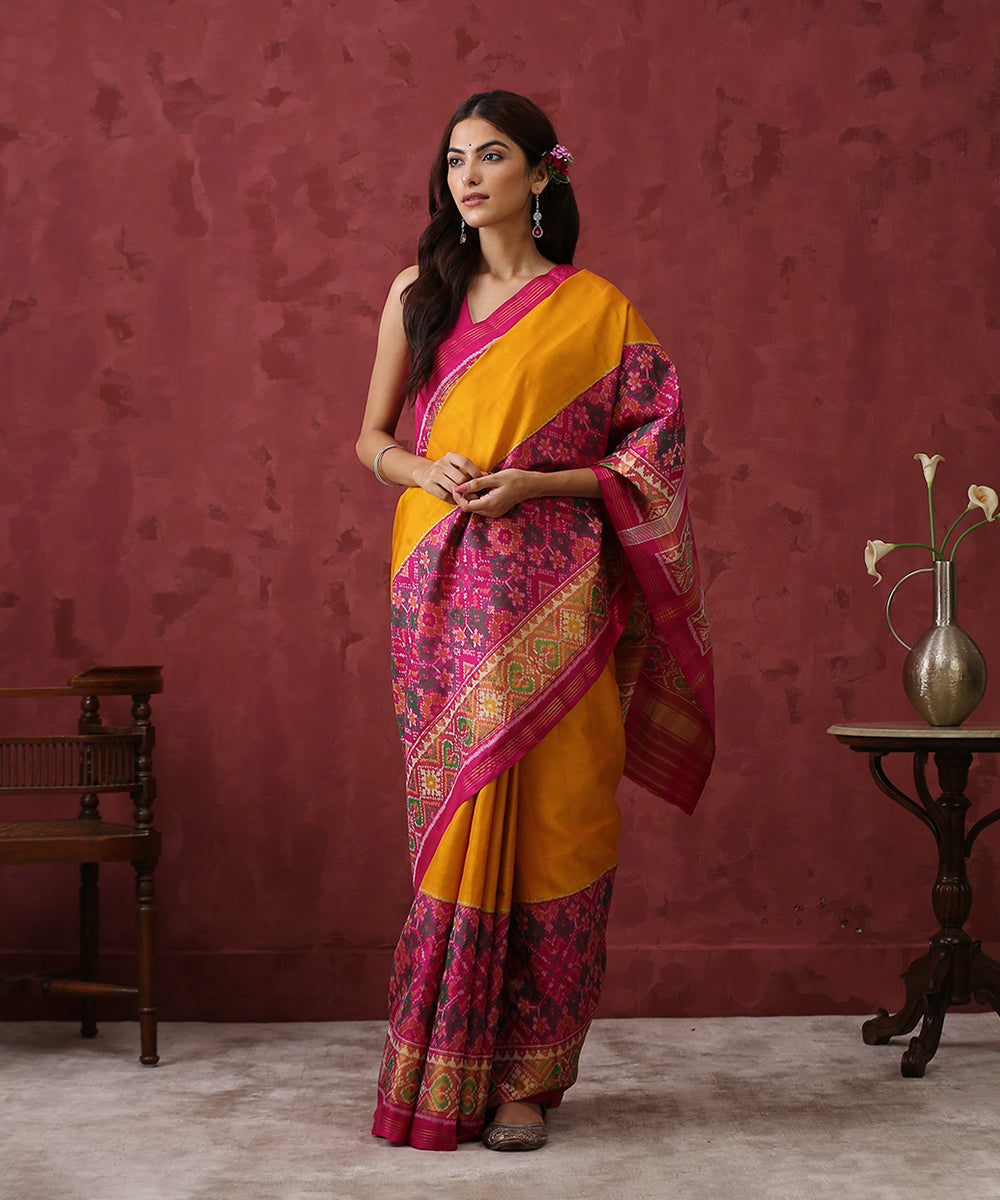 Mustard_Handloom_Mulberry_Silk_Patola_Saree_With_Pink_Border_WeaverStory_02