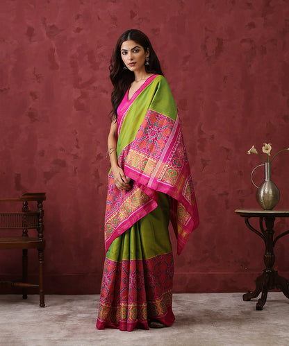 Handloom_Parrot_Green_Mulberry_Silk_Patola_Saree_With_Pink_Border_WeaverStory_02