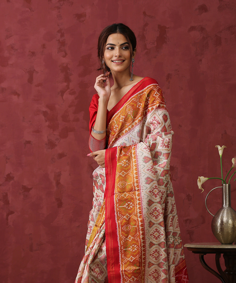 White_Handloom_Mulberry_Silk_Patola_Saree_With_Red_Border_WeaverStory_01