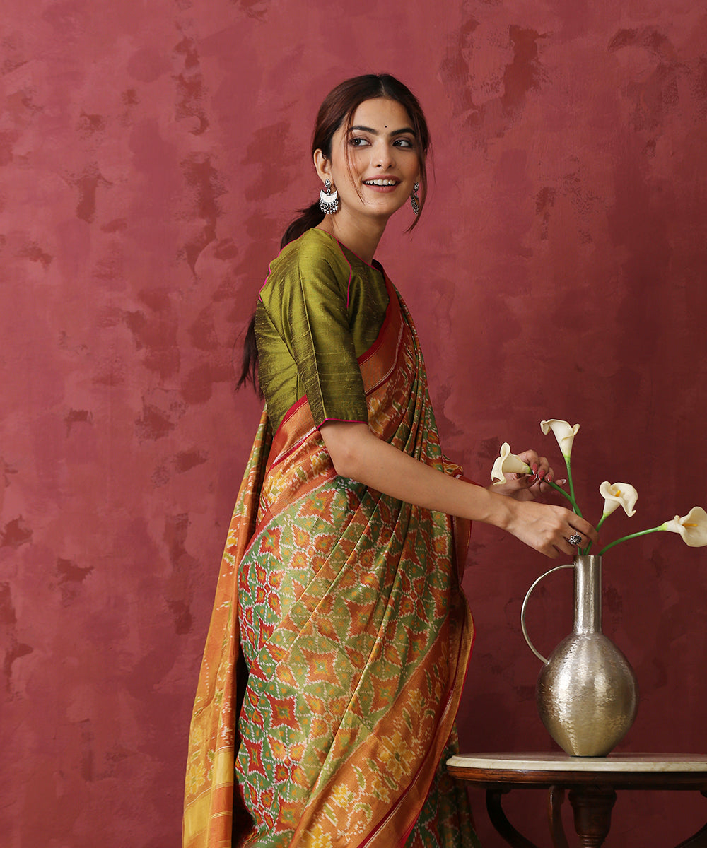 Green_Handloom_Tissue_Silk_Patola_Saree_With_Red_Border_WeaverStory_01