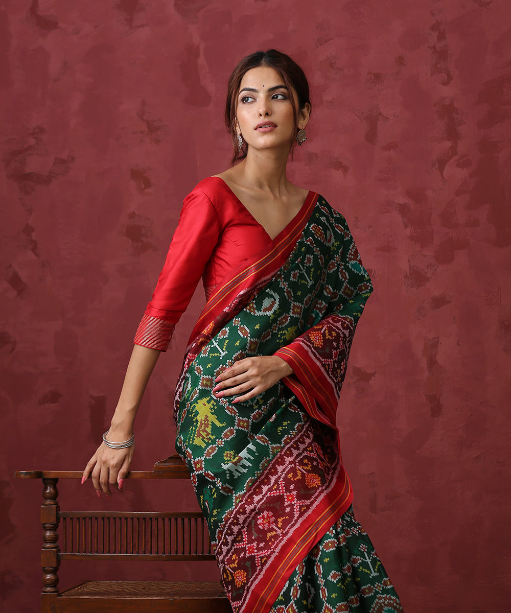 Green_Handloom_Mulberry_Silk_Patola_Saree_With_Red_Border_WeaverStory_01