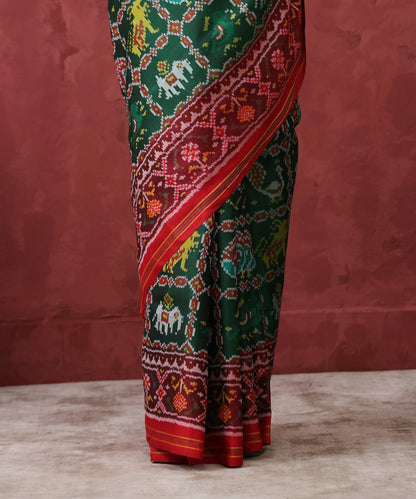 Green_Handloom_Mulberry_Silk_Patola_Saree_With_Red_Border_WeaverStory_04