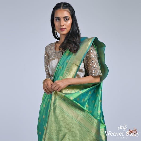 Forest_Green_katan_silk_saree_with_asharfi_booti_WeaverStory_01