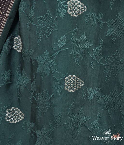 Bottle_green_and_wine_Banarasi_Tanchoi_saree_with_a_parsi_gara_weave_border_WeaverStory_03