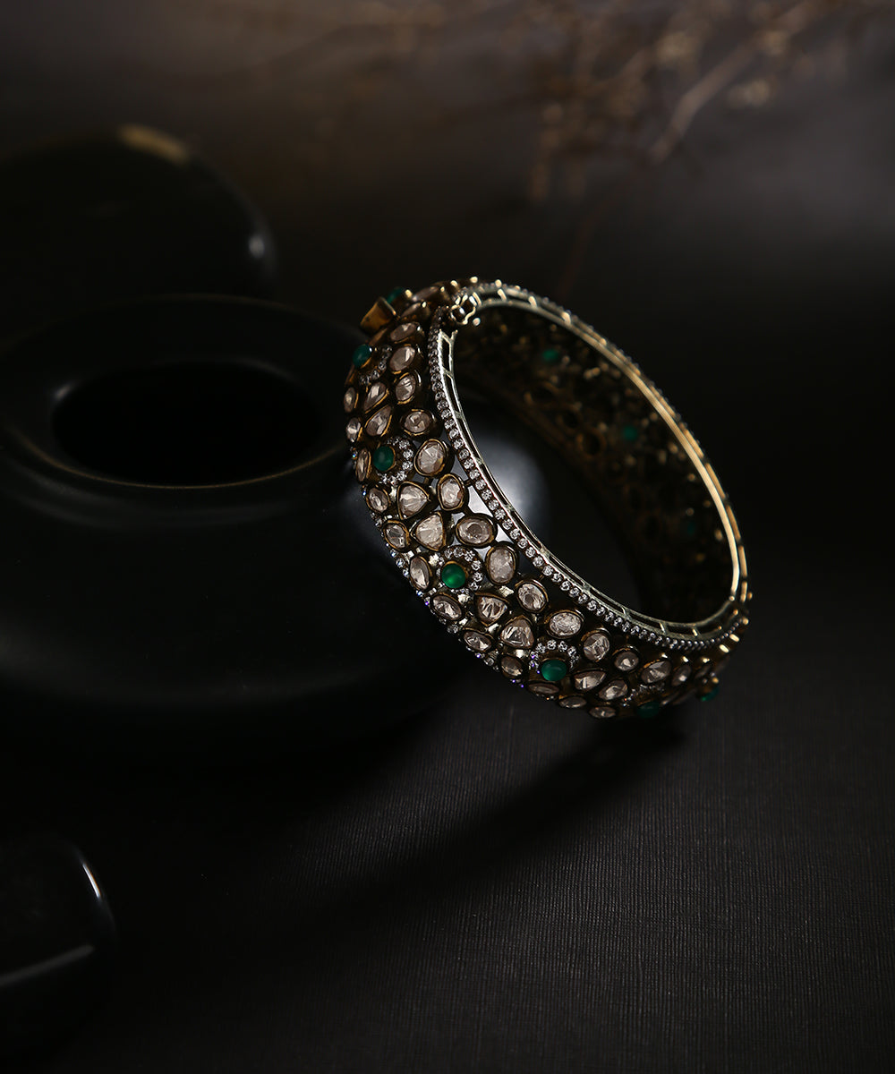 EIqra_Handcrafted_Pure_Silver_Bangle_With_Moissanite_Polki_And_Emeralds_WeaverStory_01