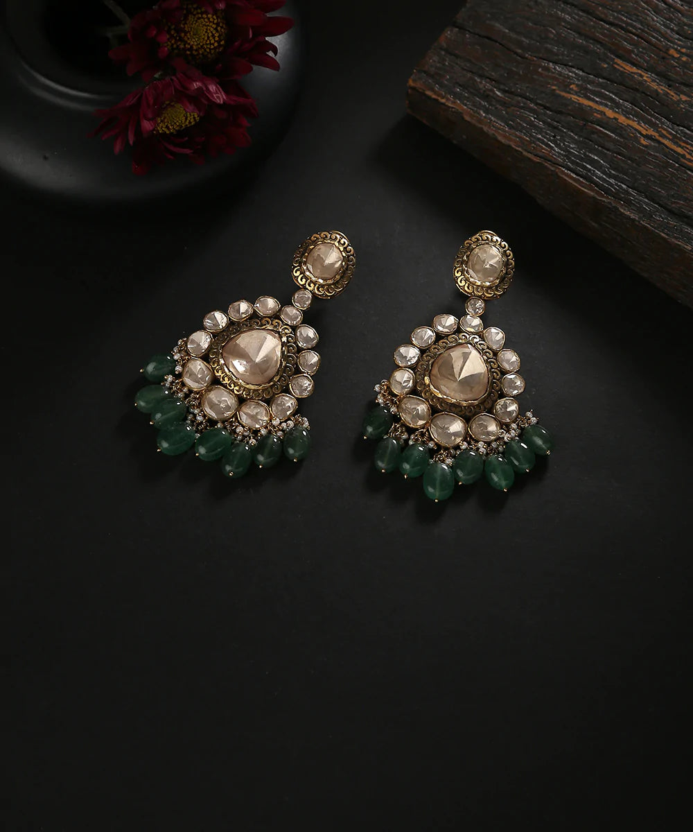 Kavya_Handcrafted_Earrings_With_Moissanite_Polki_And_Emeralds_In_Pure_Silver_WeaverStory_01