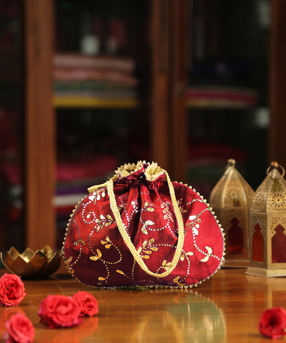 Red_Hand_Embroidered_Raw_Silk_Potli_With_Golden_Leaf_Hand_Embroidery_WeaverStory_02