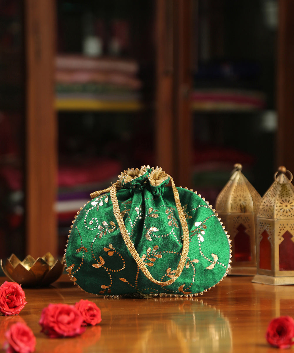 Green_Raw_Silk_Potli_With_Golden_Bel_And_Leaf_Hand_Embroidery_WeaverStory_02