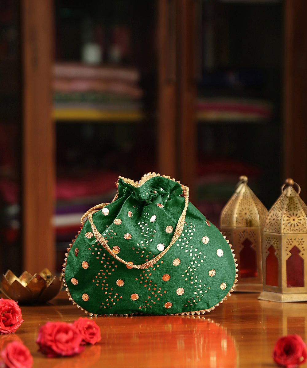 Green_Raw_Silk_Hand_Embroidered_Potli_With_Golden_Big_And_Small_Dotted_Sequin_Work_WeaverStory_02