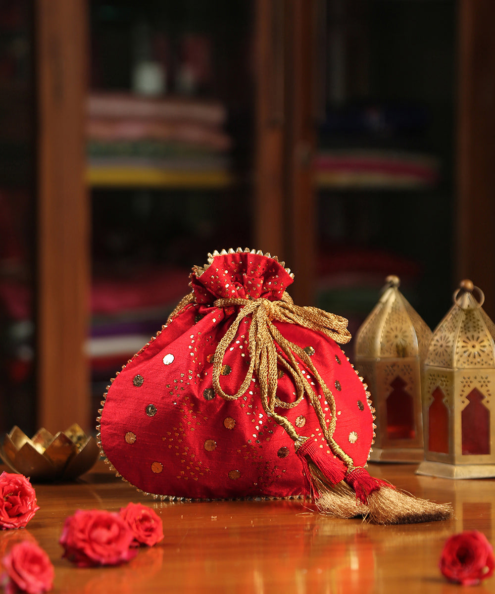 Red_Raw_Silk_Hand_Embroidered_Potli_With_Big_And_Small_Sequin_Dots_All_Over_WeaverStory_01