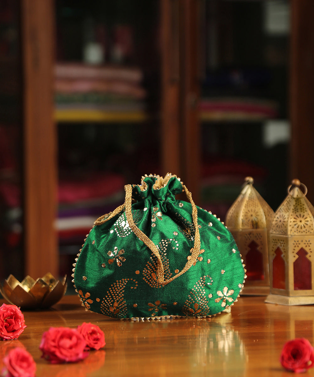 Green_Raw_Silk_Hand_Embroidered_Potli_With_Golden_Paisley_And_Flower_Work_WeaverStory_02
