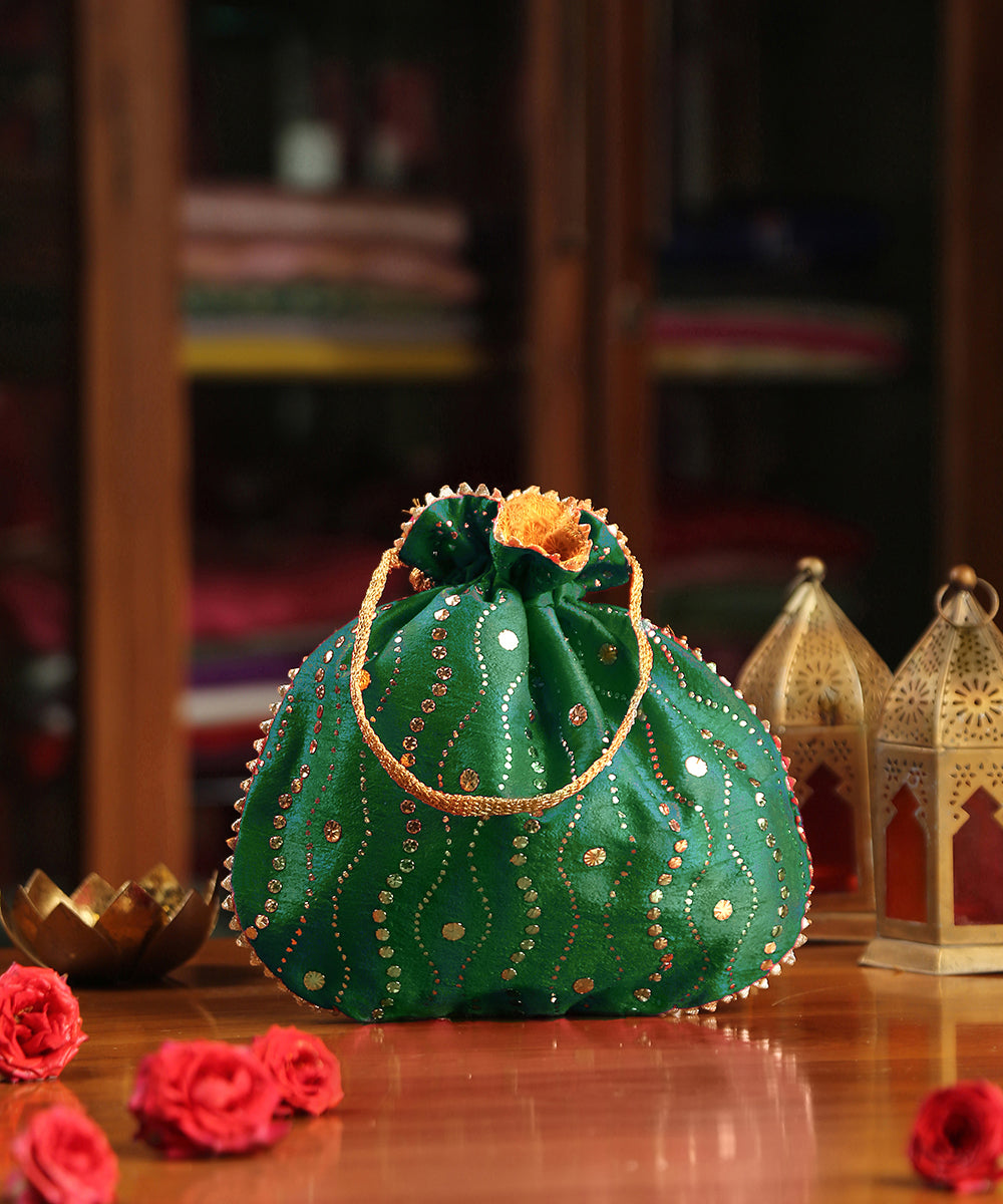 Green_Hand_Embroidered_Raw_Silk_Potli_With_Dotted_Sequins_All_Over_WeaverStory_01