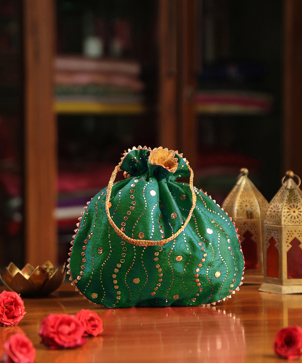 Green_Hand_Embroidered_Raw_Silk_Potli_With_Dotted_Sequins_All_Over_WeaverStory_02
