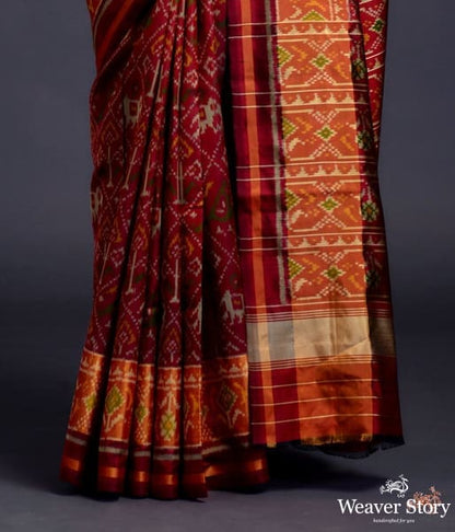 Mahroon_single_ikat_patola_saree_with_tissue_border_WeaverStory_04
