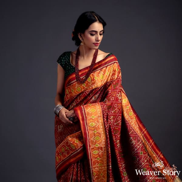 Mahroon_single_ikat_patola_saree_with_tissue_border_WeaverStory_01