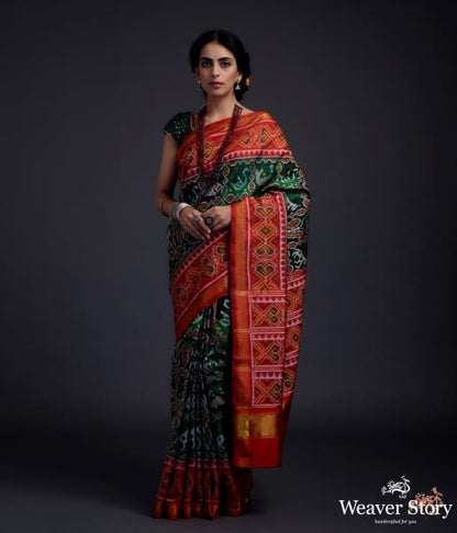 Pure_silk_Gujarat_Patola_saree_in_emerald_green_and_red_with_horse,_swan_and_fish_motifs_WeaverStory_02