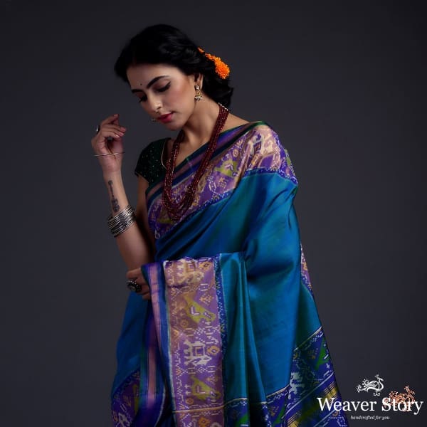 Turquoise_Blue_single_ikat_patola_saree_with_tissue_border_WeaverStory_01