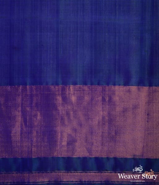Blue_dual_tone_single_ikat_patola_saree_with_a_purple_and_gold_tissue_border_WeaverStory_05