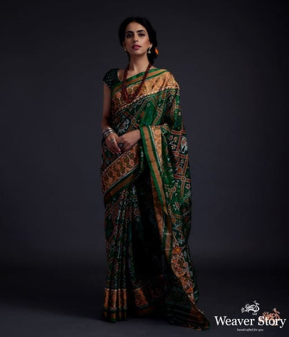 Emerald_green_single_ikat_patola_saree_with_tissue_border_WeaverStory_02