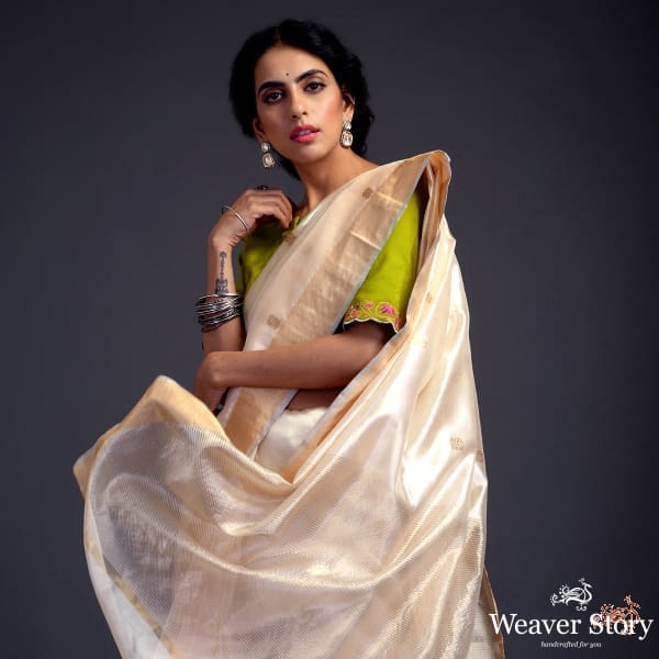 Soft_Peach_chanderi_silk_saree_with_small_floral_motifs_WeaverStory_01